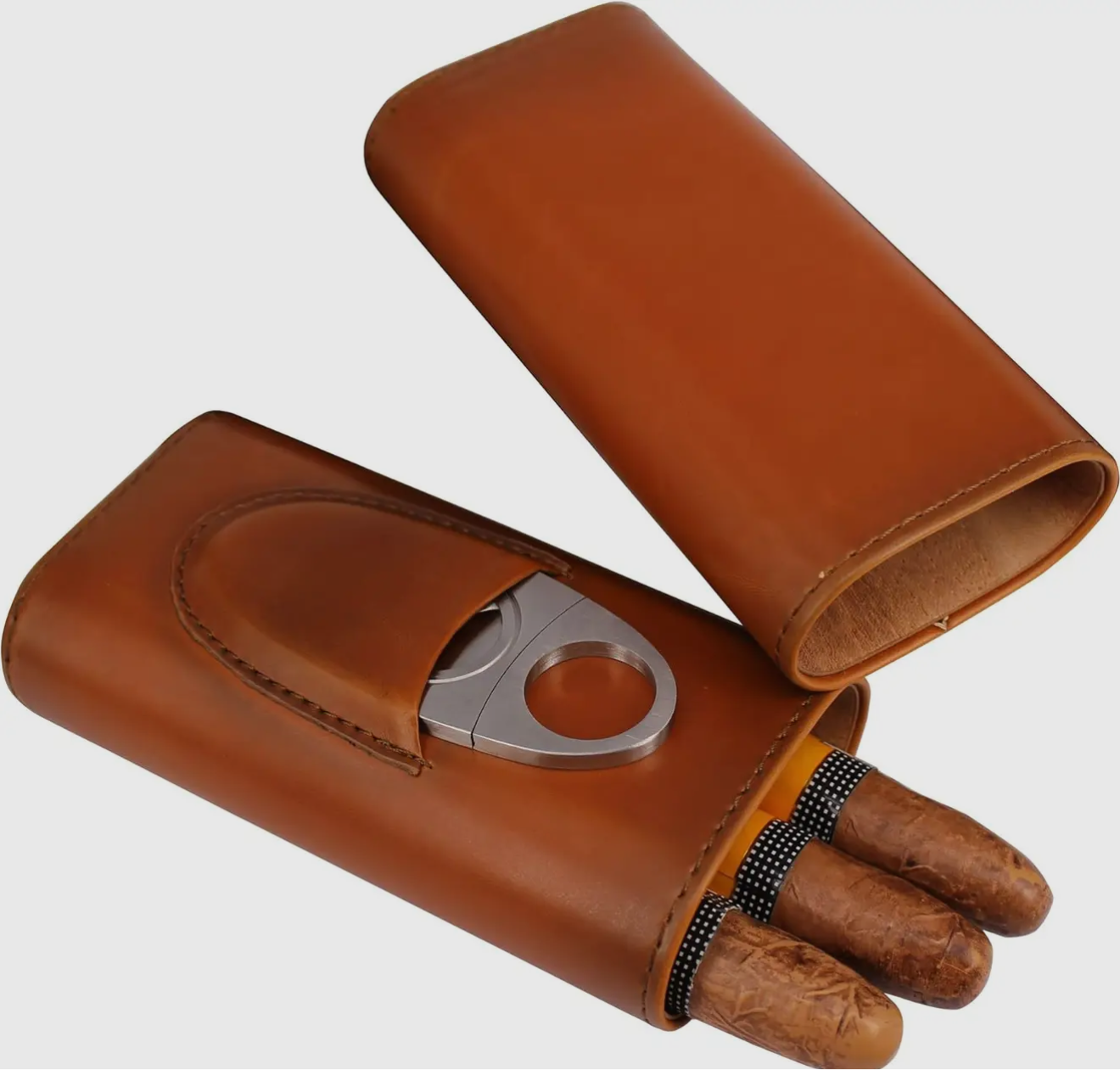 "Elegant handcrafted leather cigar case by Moon and Skye Creations, featuring a built-in stainless steel cutter pocket. Designed for cigar enthusiasts, this premium accessory offers a sophisticated blend of craftsmanship, durability, and functionality."