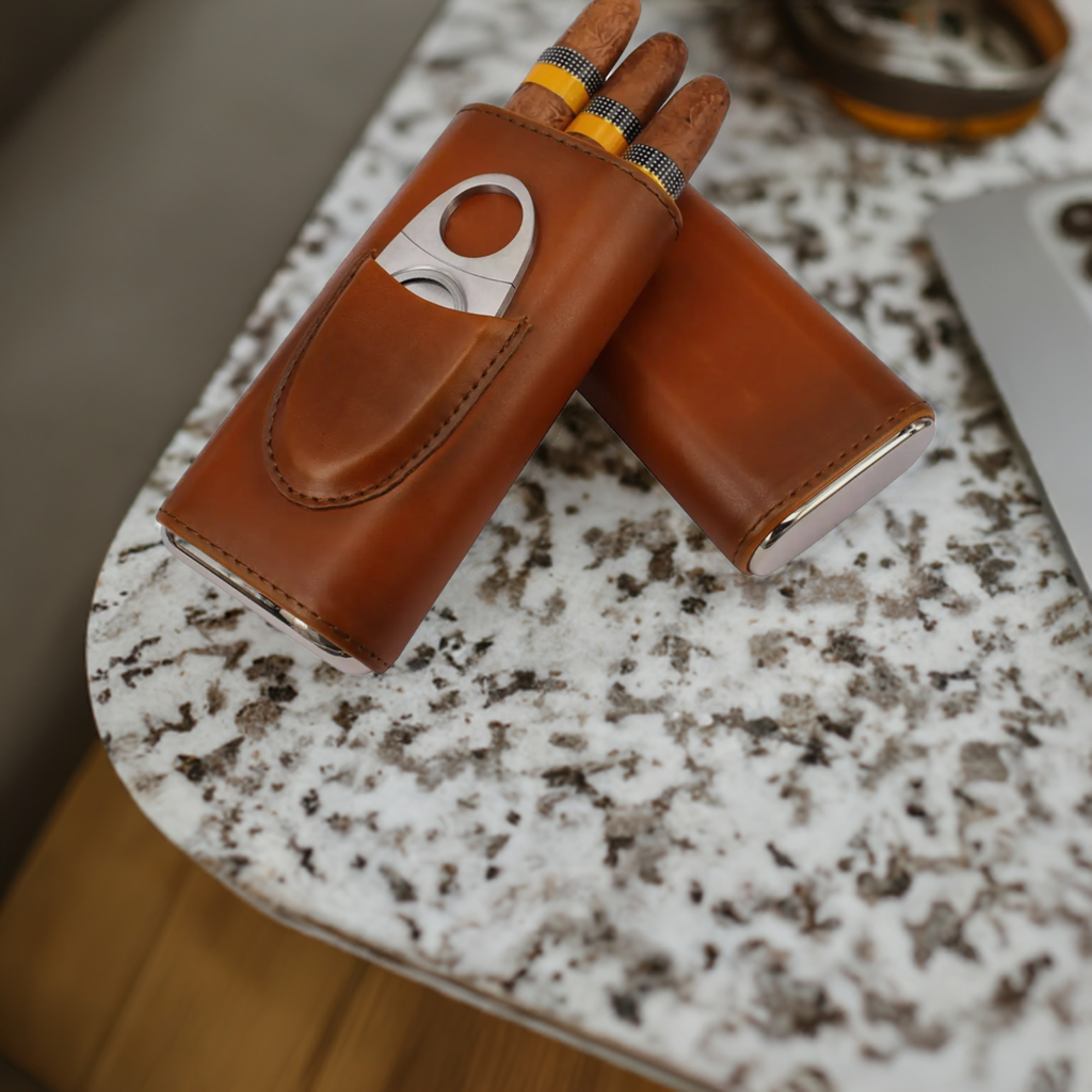 "Luxury handcrafted leather cigar case by Moon and Skye Creations, featuring a built-in stainless steel cutter pocket. Designed for the refined cigar aficionado, this elegant case combines style and functionality with premium materials and meticulous craftsmanship."