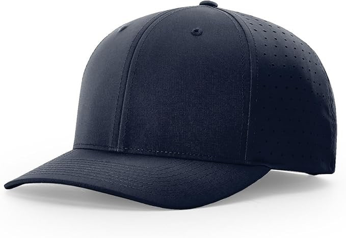 Richardson laser perforated snapback hat in solid navy blue with curved bill and ventilated side panels, ideal for custom leather patch branding.