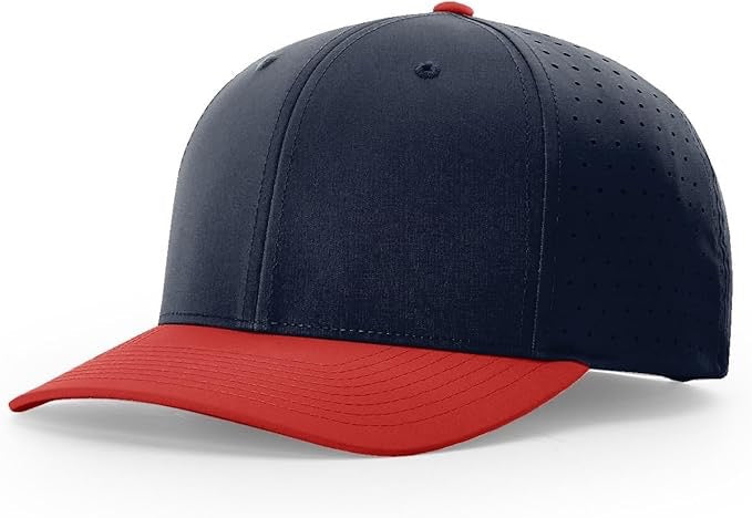 Richardson laser perforated snapback hat with navy crown, red curved bill, and breathable side panels, perfect for custom leather patch personalization.