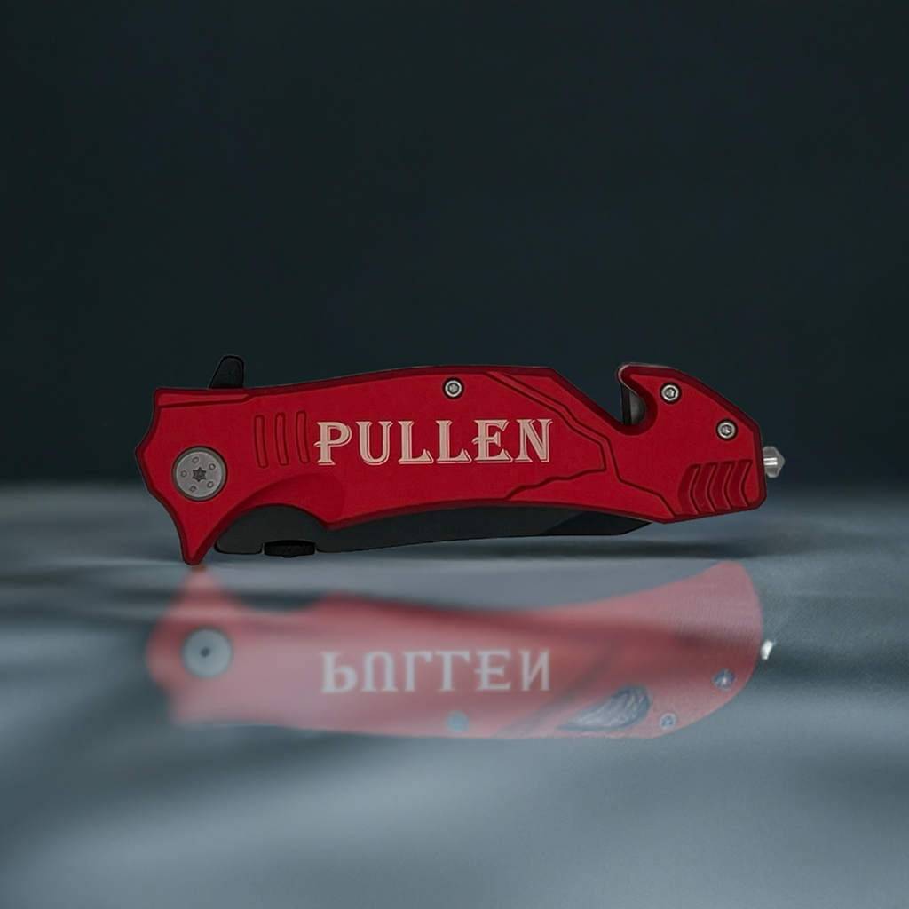 Red personalized rescue knife with black blade, partial serrated blade, seatbelt cutter, and glass breaker.