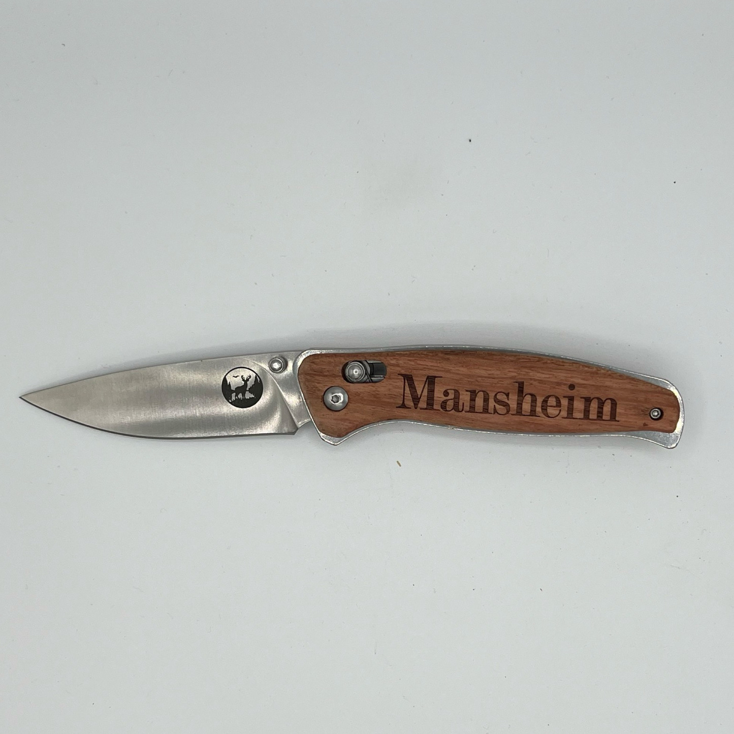 Personalized engraved Bison River folding pocket knife featuring a wood handle and stainless steel blade. The handle is customized with the name "Mansheim," and the blade includes a subtle bison logo near the hinge—ideal for gifting or everyday carry.