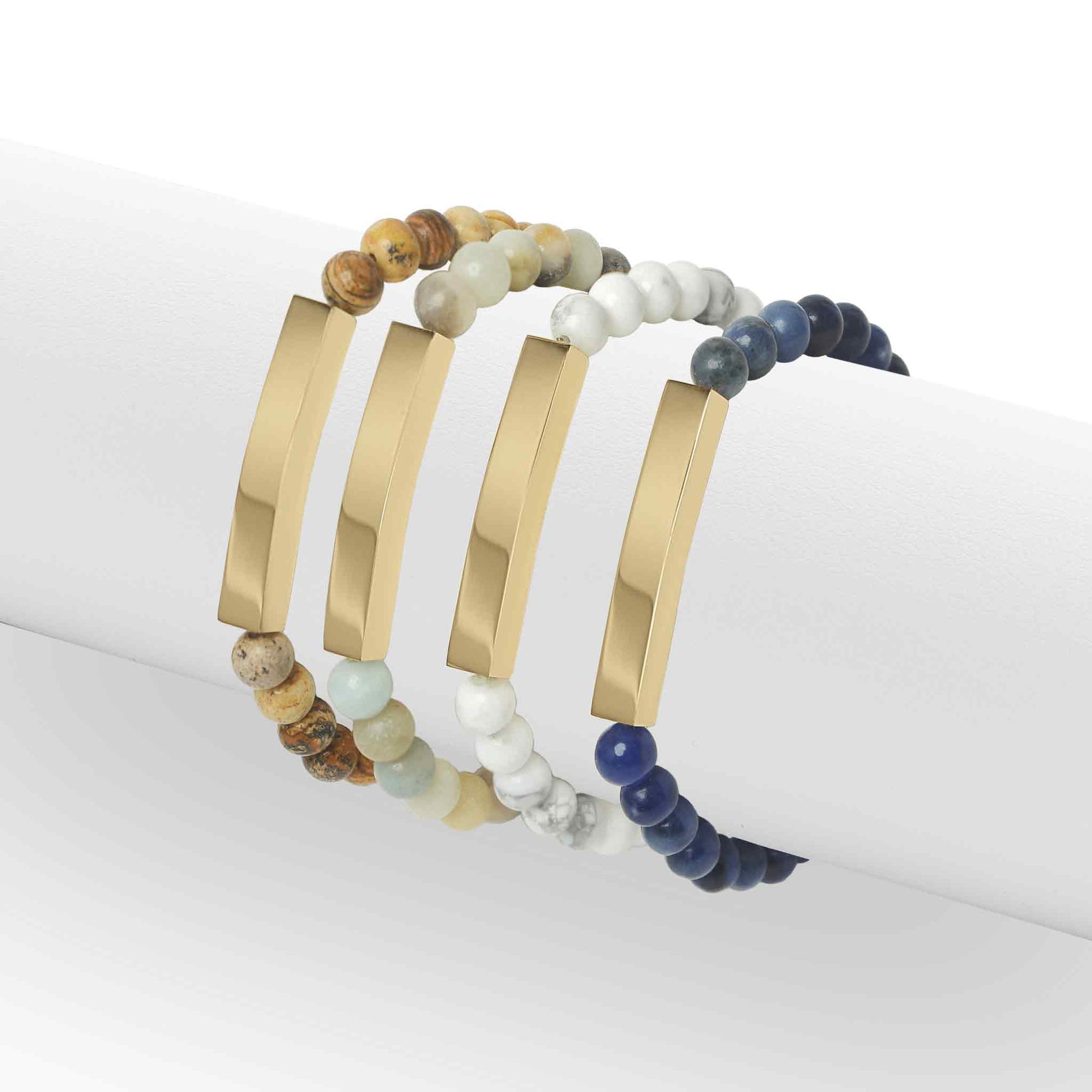 "Moon and Skye Creations gold bar bracelets featuring a variety of natural stone bead bands, including Picture Jasper, Amazonite, Howlite, and Sodalite. Stylish and customizable, perfect for personalized engravings and meaningful gifts."  